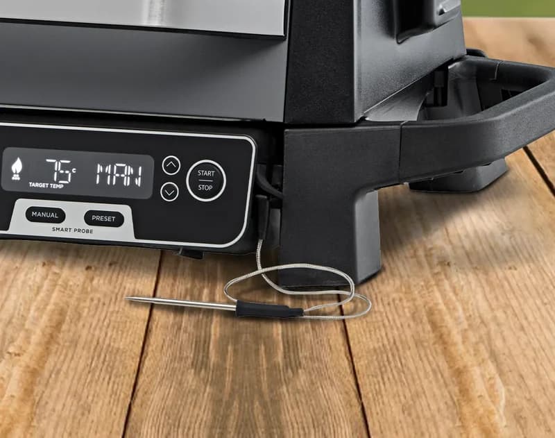 Ninja Woodfire Smart Probe next to the control panel showing a 75°C target temperature